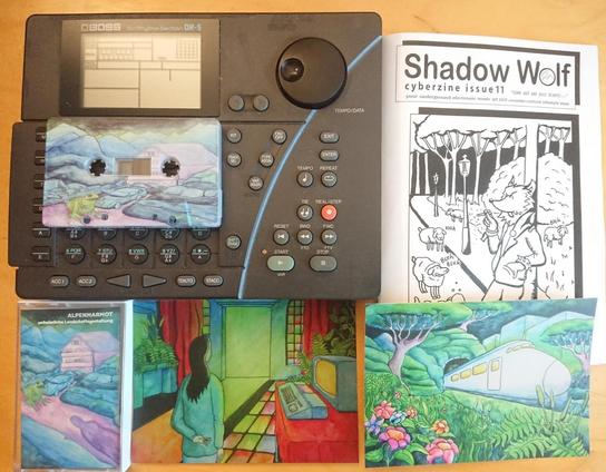 Legowelt cassette,  Shadowolf Cyberzine issue 11 and a  Boss DR-5.