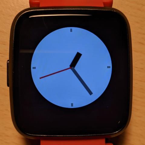 PineTime smart watch, showing an analog clock. The handles are nicely anti-aliased.