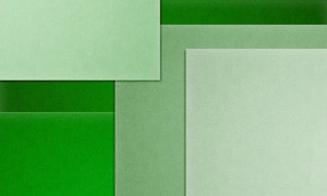 Paper coverage optimization model, overlapping pieces of green paper.