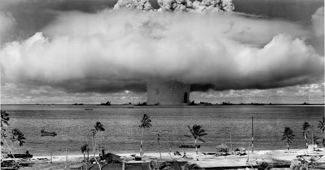Photo of the mushroom cloud from the Operation Crossroads Baker test of an underwater nuclear weapon at Bikini Atoll in 1946, showing multiple navy ships under the mushroom cloud