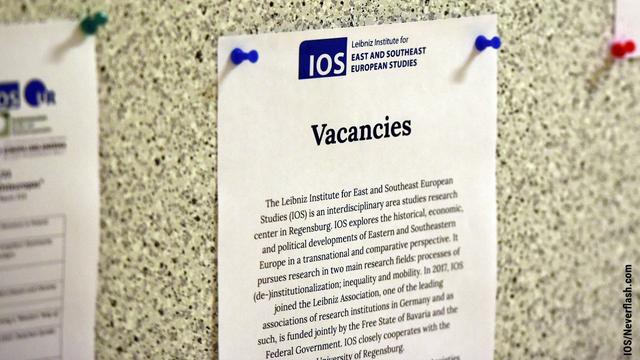 Pinboard with job advertisement as symbol for IOS vacancies