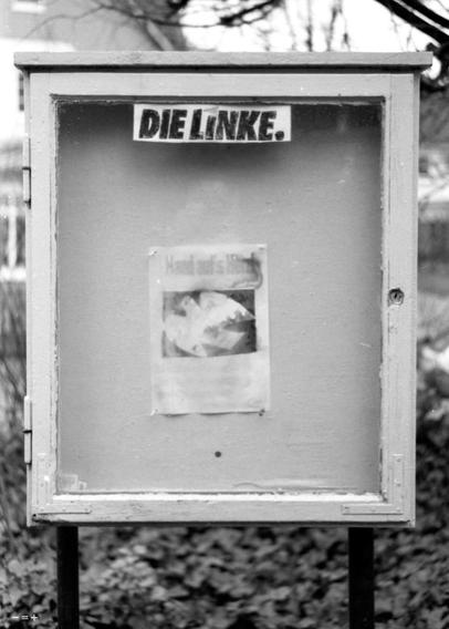 Showcase of the political (left) party Die Linke in a small town on the shore of the Baltic Sea in eastern germany.
