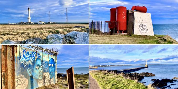 Four photo collage, clockwise from top left: looking over a stone wall to a white lighthouse and two telecoms masts, sea and blue sky in background; bright red fog horn, white wall with graffiti on it, sea and blue skies in background; grassy verge leading to small white breakwater lighthouse, looking across sea to skyscrapers and urban landscape; blue graffiti including two heads, on barbed wire topped wall, looking out to sea. A bright and mild mid-December day, skies bright blue with white clouds.