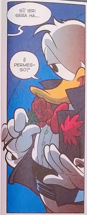 A panel from the story "Double Duck - Una missione lunga tre giorni" (translation: A three-days-long mission). 

It shows Double Duck dressed elegantly and smelling a red rose. He interrupts another character (not shown) who was speaking, just to retorically ask if he can enter the room. The background of the image is an intense blue, that contrasts well with the white red and black of the character.