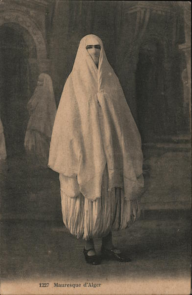 An old postcard showing the same outfit as in the first photo, but now more static and easier to decipher.
