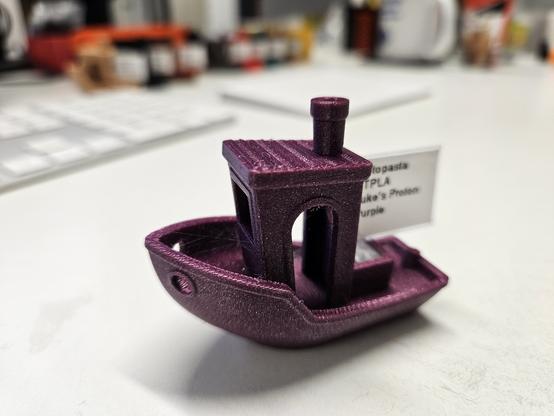 A beautiful glittery pink 3d printed boat.
