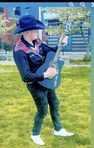 Samuel Alvarado playing guitar