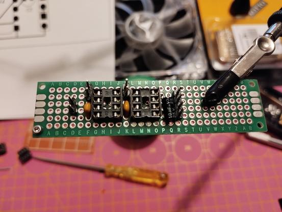 loose fit test with the biggest components inserted into the perfboard. resistors will be placed on the bottom side using SMD components