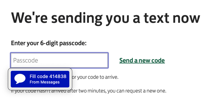 screenshot of a  dialog box asking for a passcode and the sms containing the passcode coming up beside it from a mobile phone - notionally a separate device.