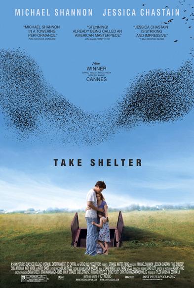 theatrical movie poster for TAKE SHELTER (2011).

A daughter, mother, and father embrace and stand in a wide field, with hazy forest and subburbs in the distance. They stand in front of an open storm cellar. The majority of the image is wide open blue sky with wispy clouds, dominated by a murmuration of birds forming an undulating ribbon in the daytime sky.