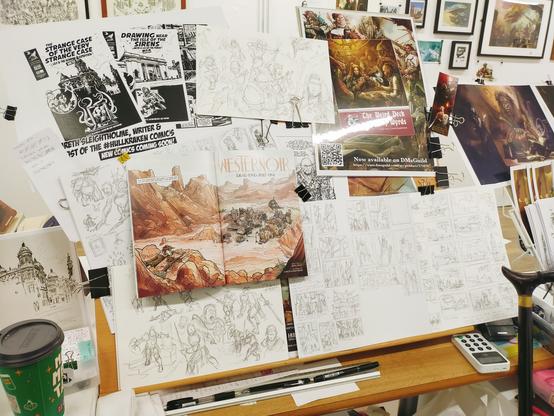 The printed book on the drawing board on which Weaternoir Dead End pt 1 was drawn back in the summer and where I'm once again sat drawing.