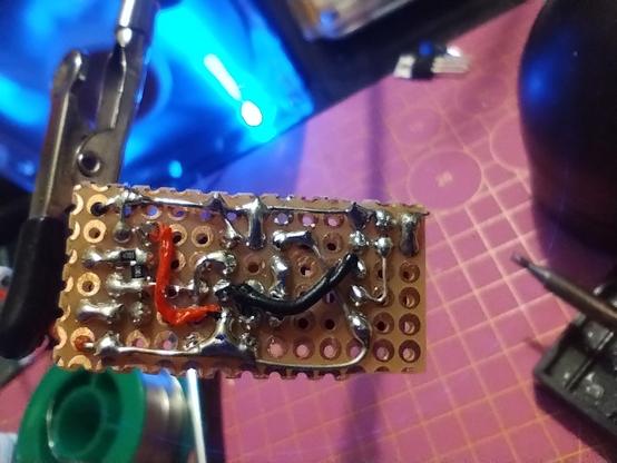 back side of the circuit board. there are two jumper cables crossing other wires. it looks a bit messy, though