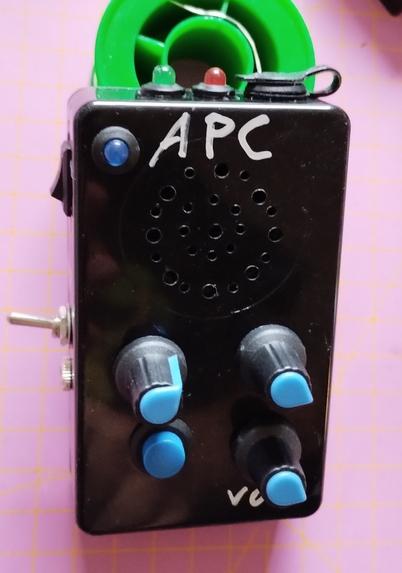 the finished Atari Punk Console. the front is kept in blue and black, including the power LED. the charging indicator LEDs at the top are red and green.