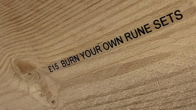 £15 burn your own rune sets (label affixed to the underside of a pine wood plank)