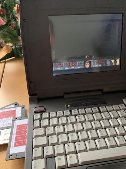 An old laptop running doom.