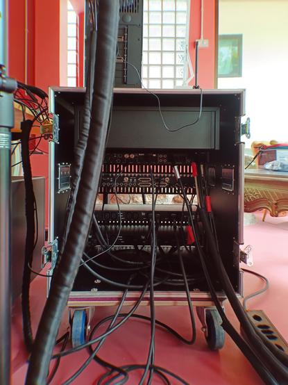 Backside of my studio rack with lots of cables. Most cables have (yet to be labeled) Cablebug (s) on them.