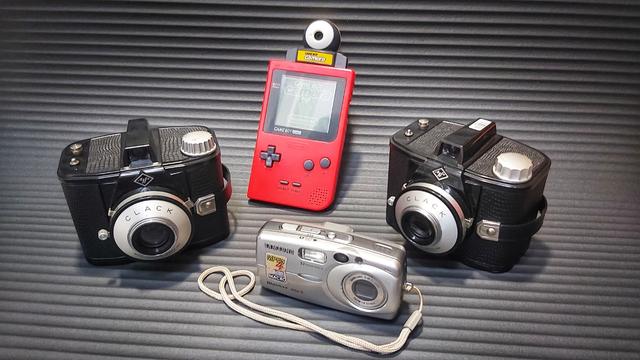 My top three cameras of 2023: The Agfa Clack (plus flipped lens version), the Samsung U-CA3 and the Nintendo Gameboy.
