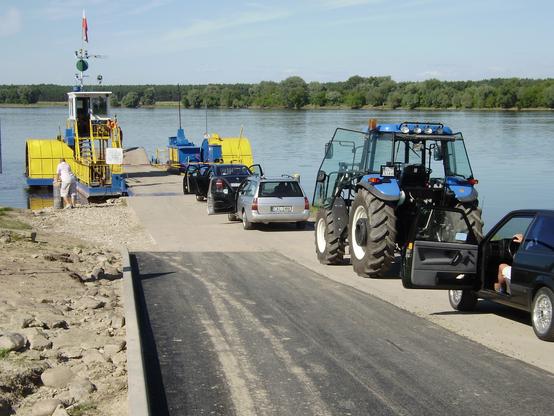 photo - loading vehicles on car ferry across the Vistula River