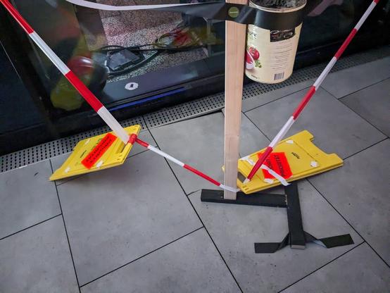 A slightly broken but well-secured floor tile