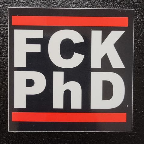a sticker with the label FCK PhD