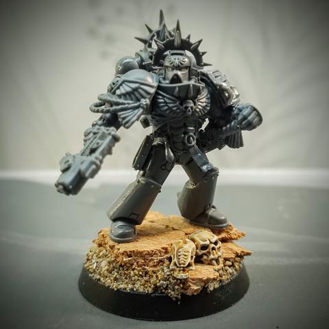 A space marine captain. No cape.