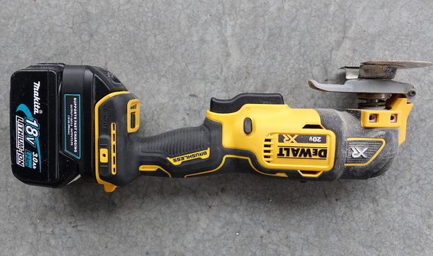 A DeWalt 20V tool using a Makita battery with a Waitley adapter.