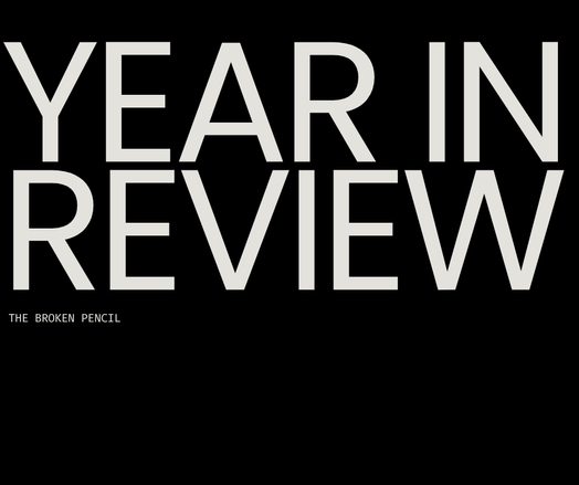 Imagen en negro con letras plancas que pone YEAR IN REVIEW the broken pencil