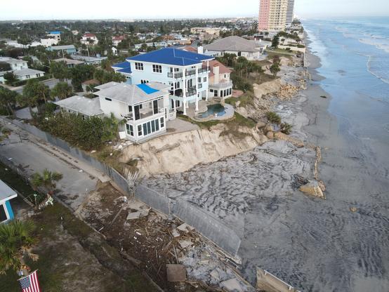 hurricane / storm surge erosion affecting structures on coast, FL