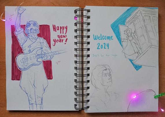 An A5 size open sketchbook showing my last sketch of 2023 on the left page and my first one of 2024 on the right page. Left one is a blue pen sketch of Sodo, lead guitarist of Ghost. Right one are two pencil sketches of the 13th Doctor and the TARDIS.