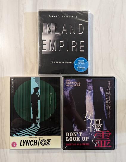 A Blu-Ray and 2 DVDs:
-David Lynch's INLAND EMPIRE

-Hideo Nakata's DON'T LOOK UP aka GHOST ACTRESS/GHOST OF AN ACTRESS

-The documentary LYNCH/OZ directed by Alexandre O. Philippe and featuring:
Amy Nicholson (film critic)
Rodney Ascher (Room 237)
John Waters (duh)
Karyn Kusama (Girlfight)
Benson & Moorhead (The Endless, etc)
David Lowery (The Green Knight, etc)