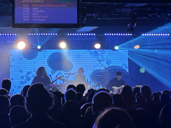 A band called Pale Blue Eyes playing live.