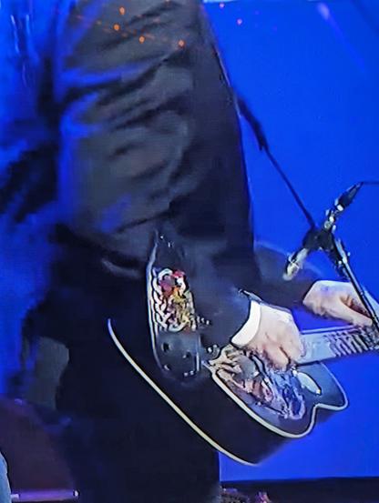 Another lose up of Jerry's dobro strap with dancing bear