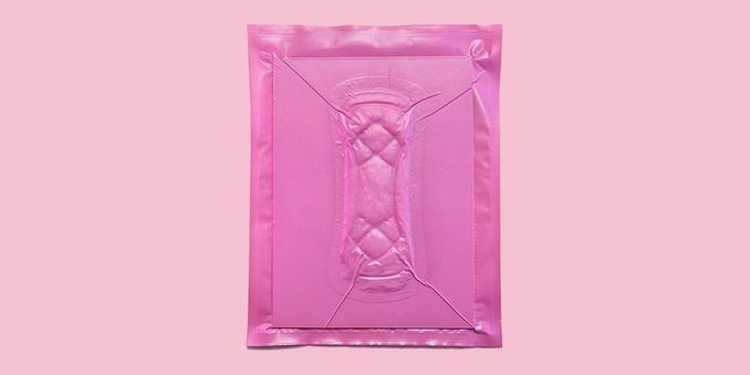 photo of maxi pad hermetically sealed in a pink wrap