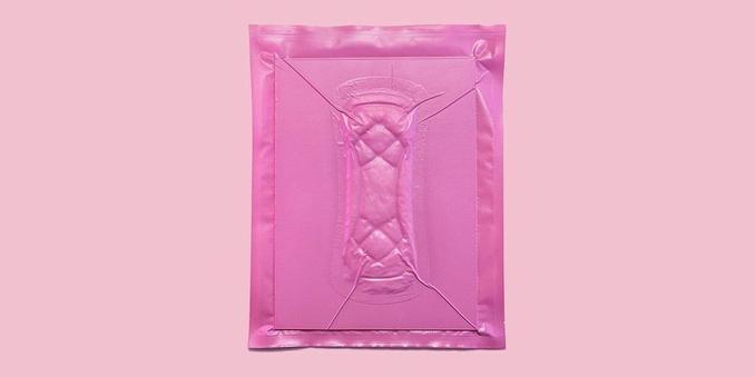 photo of maxi pad hermetically sealed in a pink wrap