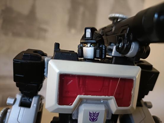 A close up of head and torso. That headsculpt is very Optimus Prime if he were a turbo nerd, um, deposed commander of evil armies.