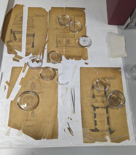 Four drawings of approximately A4 size. The tracing paper is yellowed with age and degradation. Various pieces are shattered, torn or lost.

Repairs are being made with Japanese tissue and a non-aqueous adhesive.