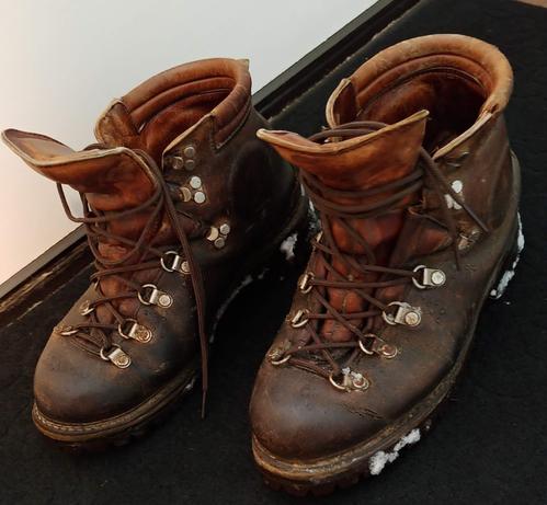Picture of two leather boots, high necked, well worn.  They were made by a company called Kelty in 1979.  Kelty is still selling camping gear.  And these boots are still going strong.