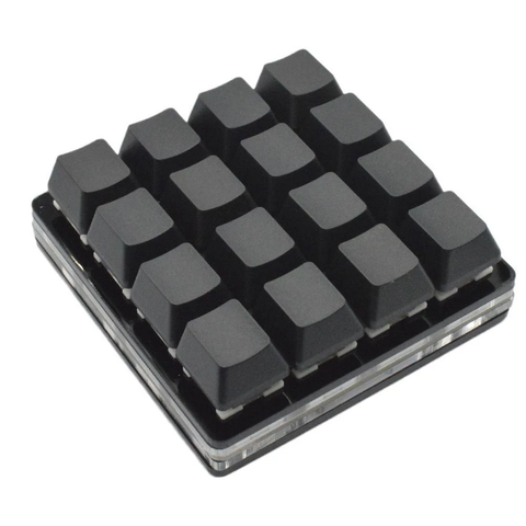 Photo of a small keyboard with 16 blank black keys in a 4 by 4 grid.