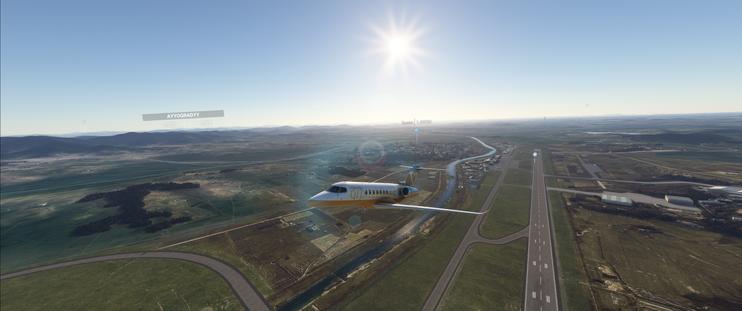 A Cessna Citation Longitude taking off from Pyongyang-Sunan heading north. Sunan is just behind the plane, and far to the south, the Ryugyong Hotel is barely visible on the horizon.