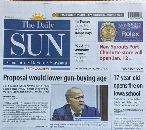 2024 January 5 newspaper (Florida's The Daily Sun, serving Charlotte, DeSoto, and Sarasota) showing headlines "Proposal would lower gun-buying age" next to "17-year-old opens fire on Iowa school"