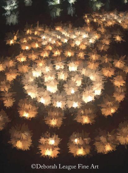 Magical luminaria display at Longwood Gardens. A few times a year, the garden hosts themed pop-up luminaria nights. Thousands of extended use tea lights that are hand lit by volunteers in various locations around the estate.

A luminaria, or little lantern, is a light from a votive candle inside a small paper bag weighted down with sand. The lantern is also known as a farolito in some parts of the world. Christians use it symbolically to light the way for the Christ child to Earth.