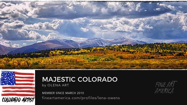 Panoramic landscape of the Colorado wilderness in fall, majestic mountain range, vibrant forest, fluffy clouds  It's a panoramic landscape capturing the beauty of the Colorado mountains in the fall. The vibrant colors and dramatic sky make this piece truly special. https://fineartamerica.com/featured/majestic-colorado-olena-art.html?newartwork=true.  #newartwork #coloradolandscape #fallcolors 
#ColoradoWilderness #FallSeason #PanoramicLandscape #MountainRange #VibrantForest #FluffyClouds #WideFormatPhotography #PicturesqueLandscape #NaturalBeauty #Vastness #Captivating #Collection #Artwork #Scenery #Art "Majestic Colorado" is a breathtaking panoramic landscape that captures the natural beauty of the Colorado wilderness at the onset of the fall season. The image showcases a grand mountain range with a dusting of snow in the background, while a dense forest with a vibrant mix of green and autumnal hues dominates the foreground. The sky overhead is filled with fluffy clouds, adding a sense of depth and expansiveness to the scene. The wide-format photography invites the viewer to immerse themselves in the vastness of the picturesque landscape, making it a captivating addition to any collection.