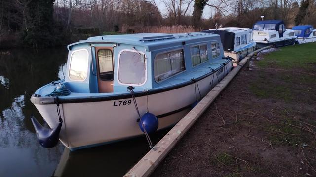 A Hampton Safari Mk3 on a riverside mooring