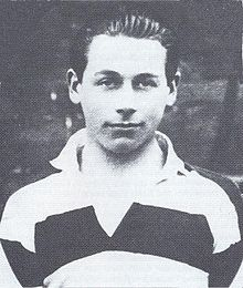 Head and shoulders shot of Kevin Barry in a stripped rugby shirt.
