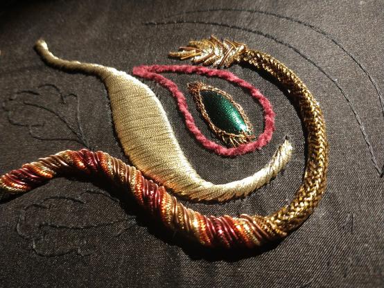 Goldwork embroidery with different structures and colours