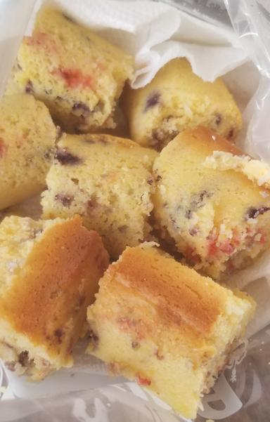 A pile of muffin cylinders, cut up into muffin size pieces.