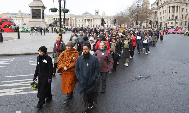 Photograph of the march as it sets out from Trafalgar Square