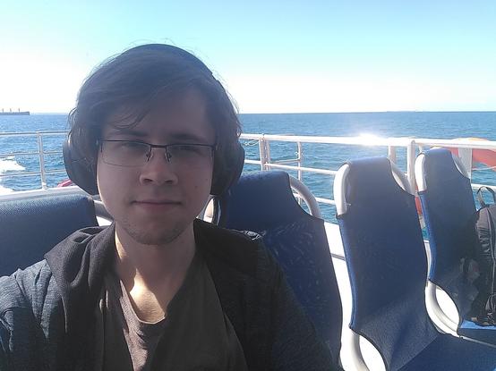 A selfie of me on the ferry, with the ocean in the background
