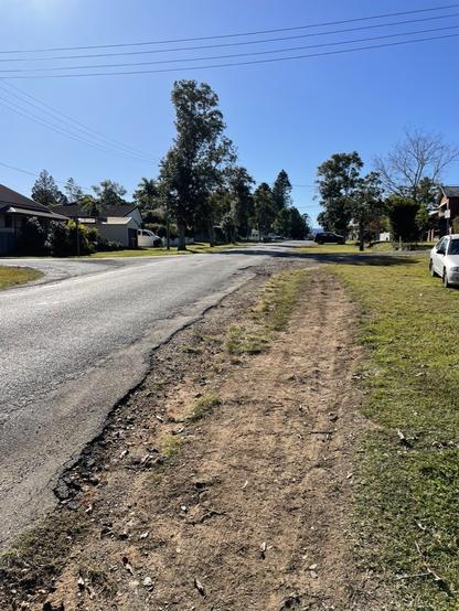 No road is every wide enough, Bellingen, but it could be anywhere in the suburbs. Note, no footpath, no cycle path, no spacial justice. Just ugly fossil fuel infrastructure.