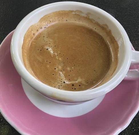 A cup of coffee, in a white cup and lilac-pink saucer…the first thingIve been able to smell and taste, after losing those senses due to Covid.